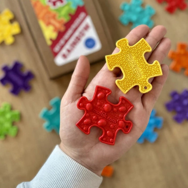 Ortopedske puzzle - setovi šarenih taktilnih privjesaka