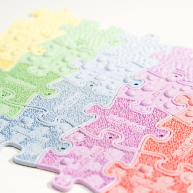 Ortopedske puzzle - setovi šarenih taktilnih privjesaka